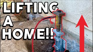 Lifting a homes foundation with Push Piers [upl. by Wilmar917]